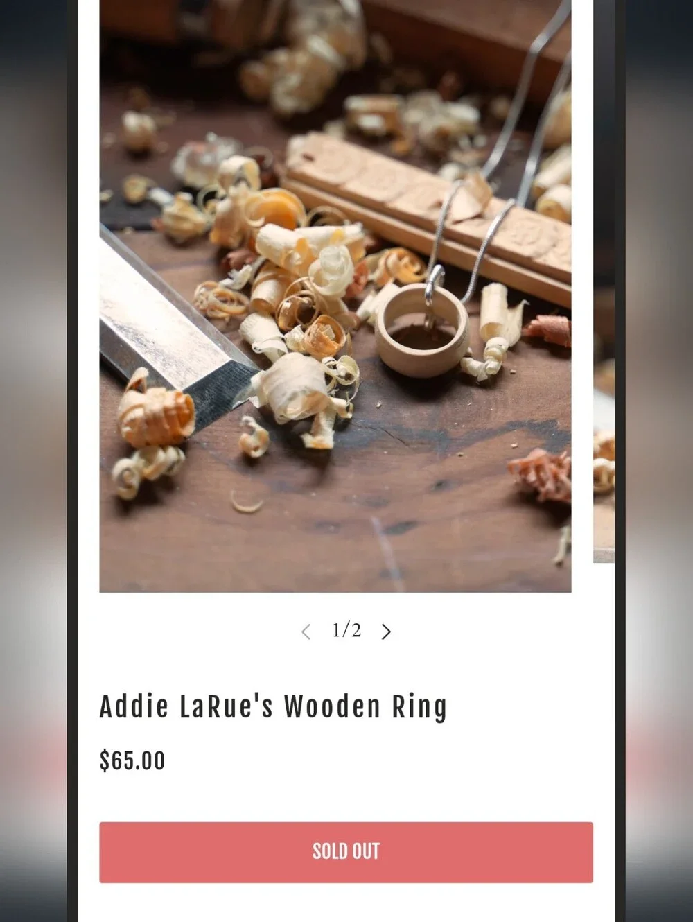 Lit Escalates Addie LaRue Wooden Ring Necklace